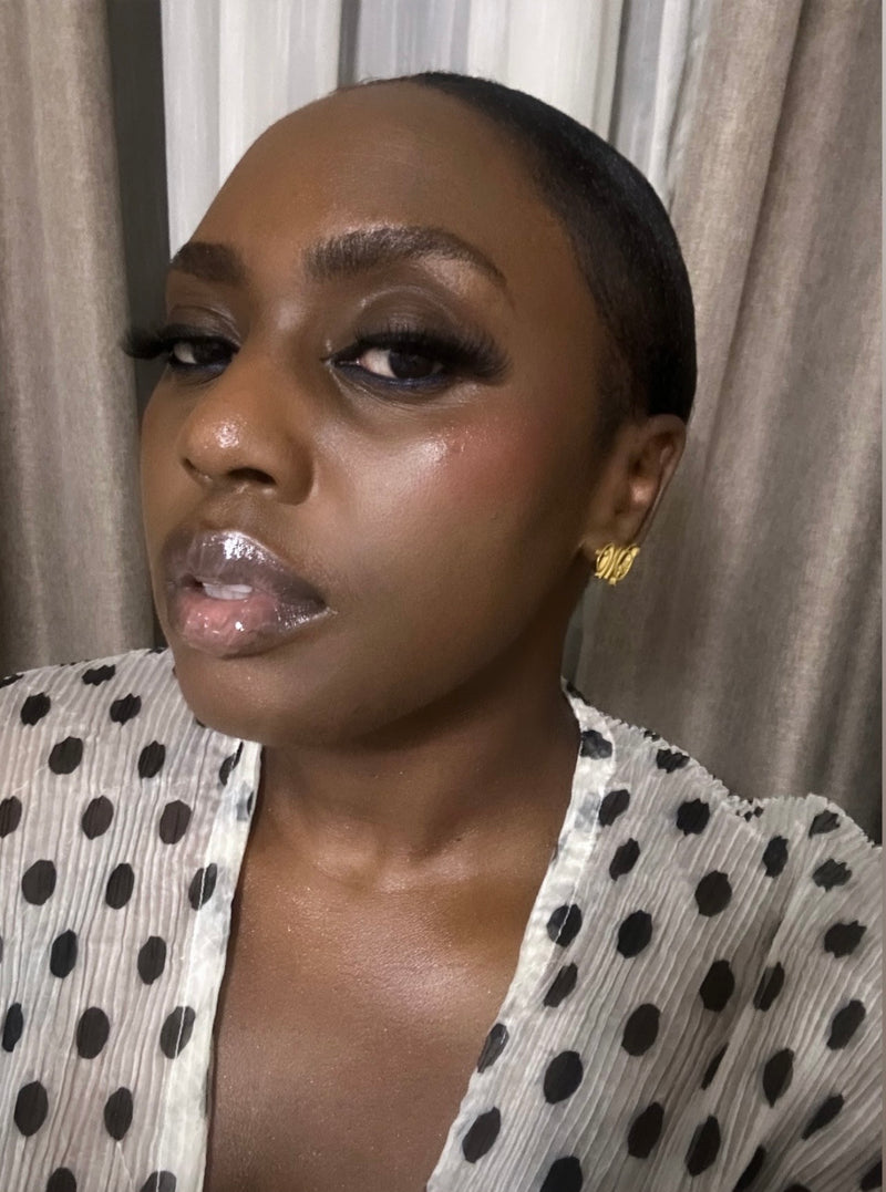 @ibijokefaborode in the WS LOGO Earrings.